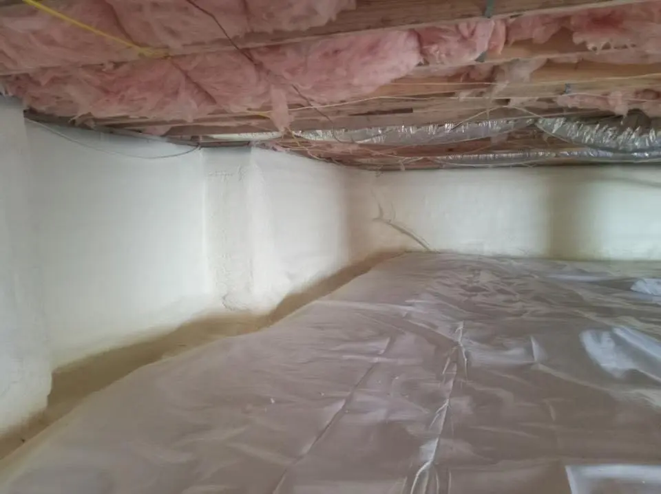 Crawl space encapsulation with closed-cell spray foam for Commercial Roof Restoration in Evanston